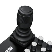 Close-up of the Middle Remote Pro's Hall-effect joystick with push button