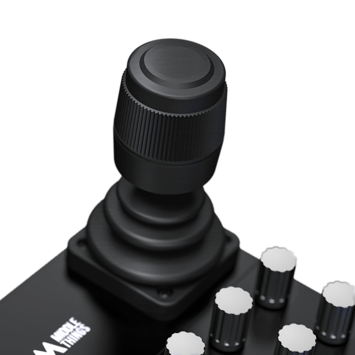 Close-up of the Middle Remote Pro's Hall-effect joystick with push button